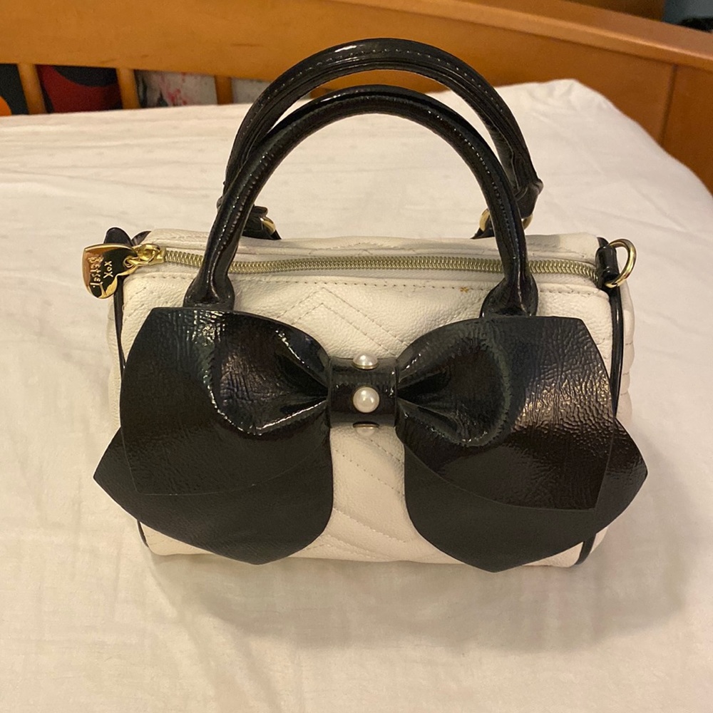 White mini double handled bag.